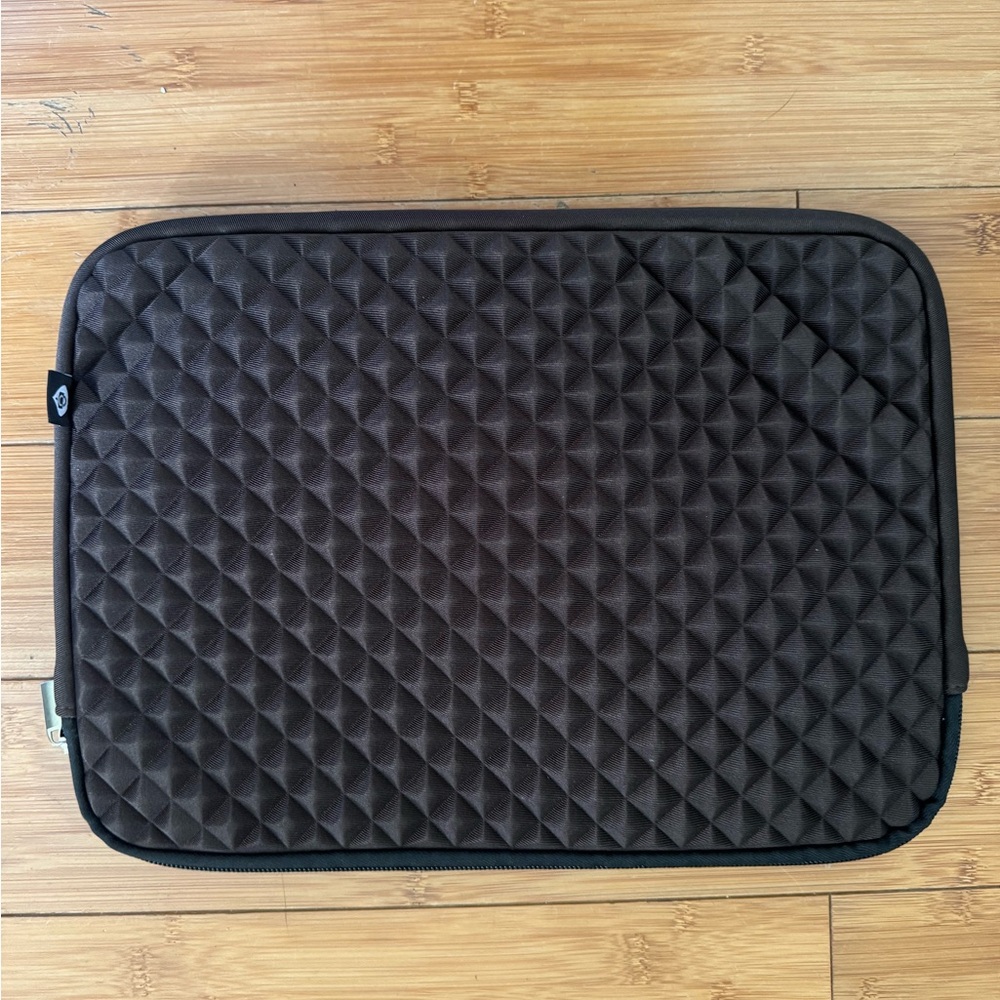 NWOT- lap top case, dark chocolate brown, 14x10”. Diamond raised pattern